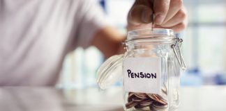 Image of a senior person putting money into a jar as a private pension top up metaphor