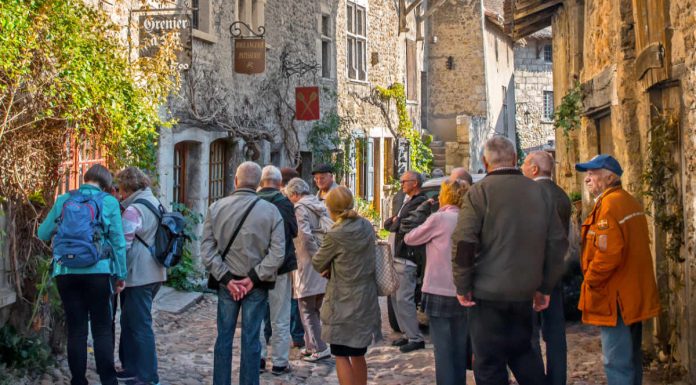 Image of a group of seniors in Perouges, France as part of an escorted holidays tour
