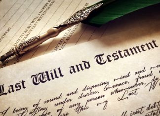 Image of making a will with a quill and parchment