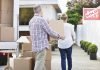 Image of a senior couple moving home using removal companies for removal and storage