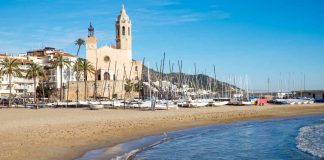 Image of a Spanish beach and town if you're thinking of retiring to Spain from UK