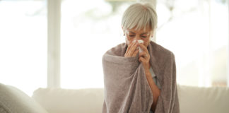 How to stop a cold developing in winter with a senior woman suffering from a cold