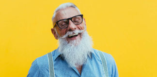 Image of a senior man against a yellow background to illustrate how to live well for longer
