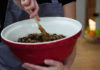 Stirring Christmas pudding mix in a bowl (Dr Oetker/PA)