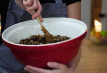 Stirring Christmas pudding mix in a bowl (Dr Oetker/PA)