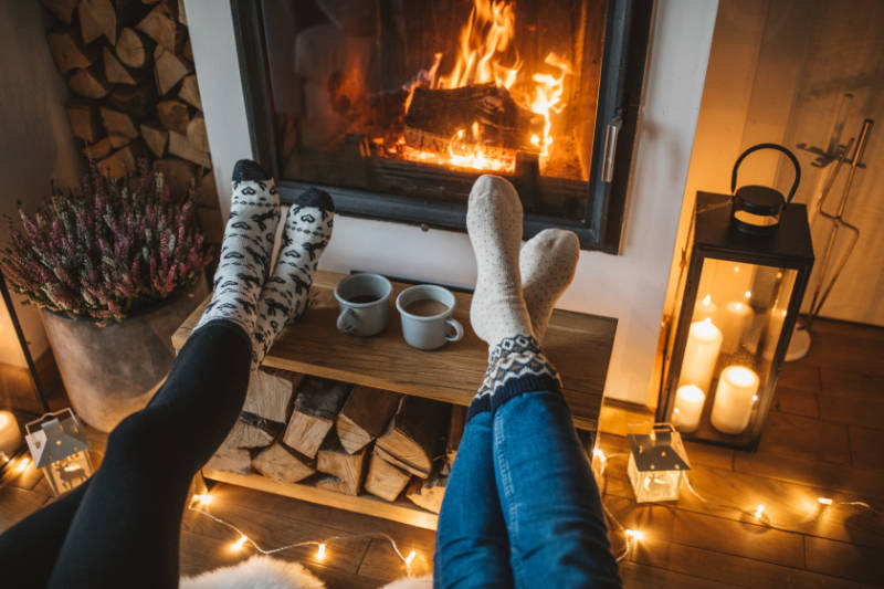 Burning candles and open fires can cause air pollution at home.