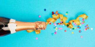 Bottle of cheap champagne with party ribbon (iStock/PA)