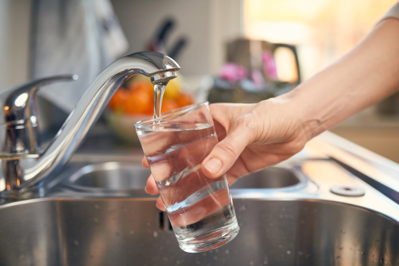 Water saving tips A generic photo of a person filling a glass with water from the tap. See PA Feature HOMES Water Waste. Picture credit should read: Thinkstock/PA. WARNING: This picture must only be used to accompany PA Feature HOMES Water Waste.