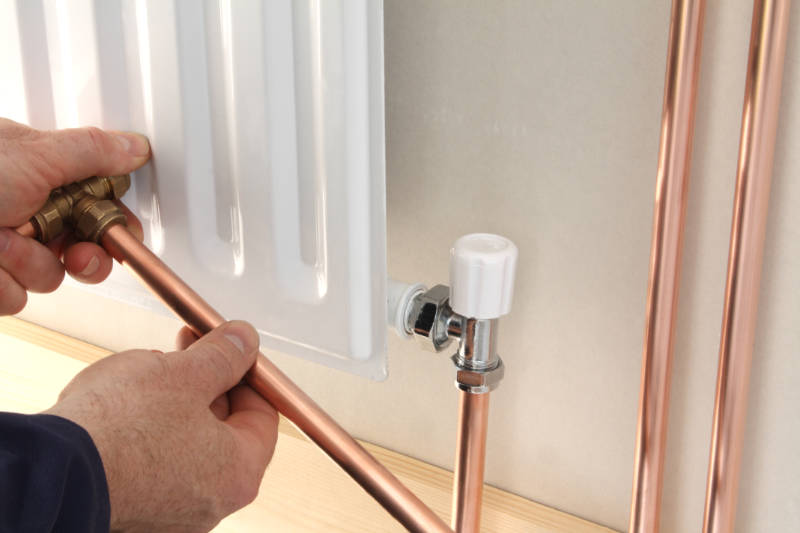 Connect the radiator to the central heating system.