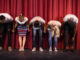 Actors bowing on the stage