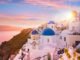 Sunset view of the blue dome churches of Santorini, Greece