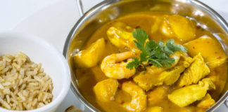 Chicken, prawn and mango curry features in Eating My Way Back To Health by Louise and Richard Blanchfield (Mark Alexander Photography/PA)