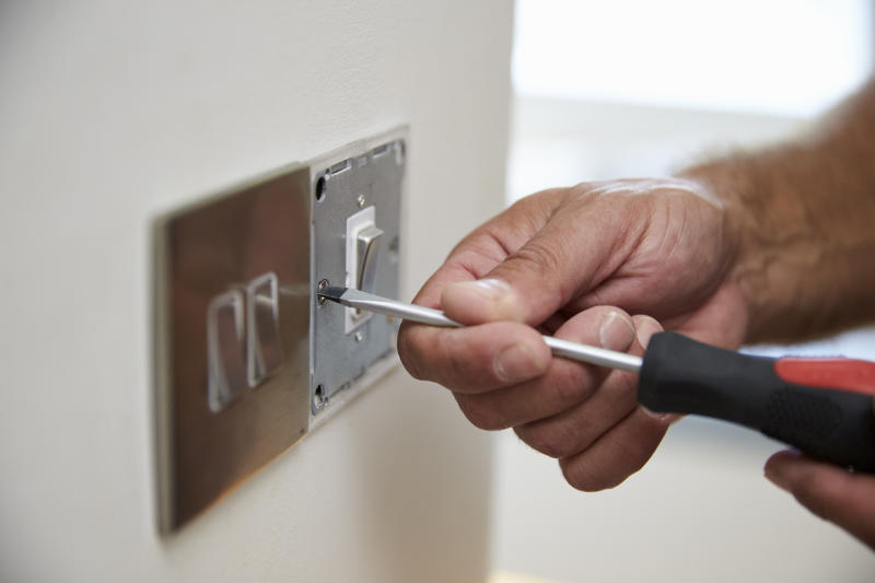Unscrew switches and sockets when wallpapering.