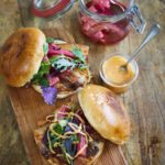 Pork baps with poached rhubarb from Giffords Circus Cookbook by Nell Gifford and Ols Halas