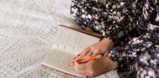 Generic photo of a woman writing in a notepad (ThinkStock/PA)