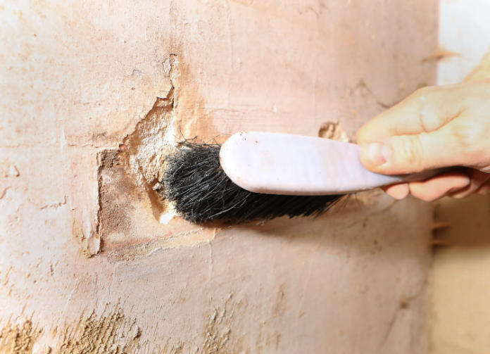 You'll need a brush to clean up the wall.