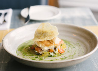 Fillets of Glitne Halibut with tomato consommé, salsa verde and fennel (Rob Coombe/PA)