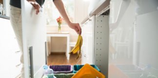 A generic photo of a woman recycling at home (Thinkstock/PA)
