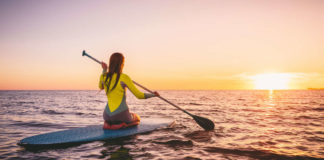 Paddleboarding is set to be this summer’s standout activity (iStock/PA)