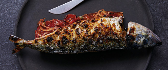 BBQ Blue mackerel and burnt tomato on toast from THE WHOLE FISH COOKBOOK: New ways to cook, eat and drink by Josh Niland (Hardie Grant/Rob Palmer/PA)
