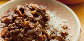 Curry goat from Original Flava: Caribbean Recipes from Home by Craig & Shaun McAnuff (Matt Russell/PA)