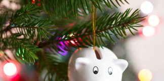 top ten money saving tips for ChristmasPiggy bank ornament on Christmas tree