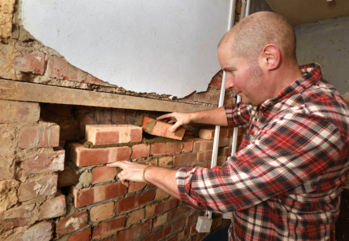 Richard Burr bricklaying (Philip Toscano/PA)