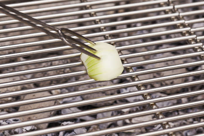 Cleaning hacks using onions to clean a bbq