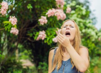 Women suffering from hay fever symptoms