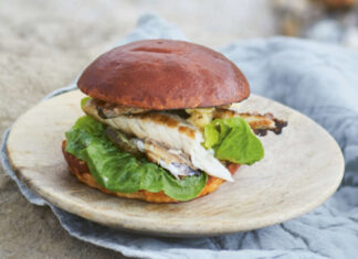 Fried mackerel, with horseradish butter, gherkins and lettuce in brioche buns