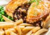 Food cravings for Homemade beef stew pie with french fries. Meat in puff pastry
