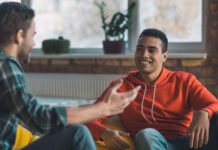 Men's mental health month Friends talking (Alamy/PA)
