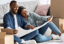 DIY tips on a budget - Young couple planning home improvements