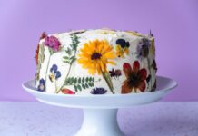 A cake decorated with edible flowers
