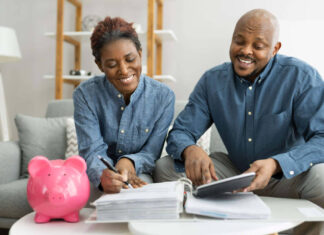 Older couple looking through their finances planning for retirement