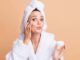 Tiktok skincare hacks: Woman applying cream to her face