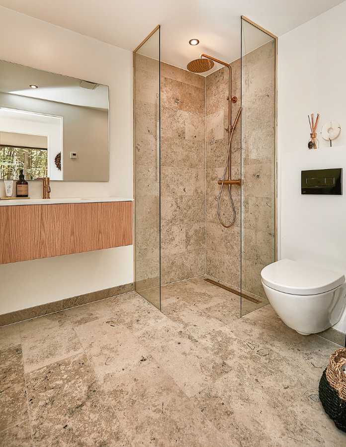 Bathroom with walk-in shower fitted with underfloor heating 