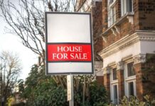 Estate Agent sign saying 'House for Sale'
