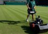 A man mowing the grass at Wimbledon
