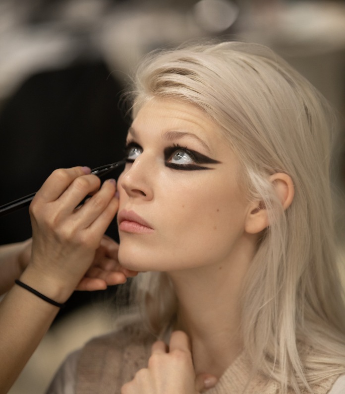 model backstage at Chanel SS22 catwalk show