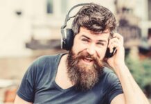 man listening to a podcast