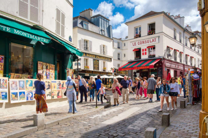 Typical cafes and art galleries in the bohemian neighborhood of Montmartre in Paris