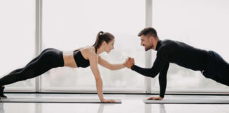 Couple doing exercises to trim waist