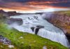 Panoramic view on Gullfoss waterfall on the Hvíta river, a popular tourist attraction and part of the Golden Circle Tourist Route in Southwest Iceland. Golden Waterfall.