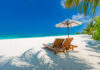 Luxury beach resort, beach loungers near the sea with white sand